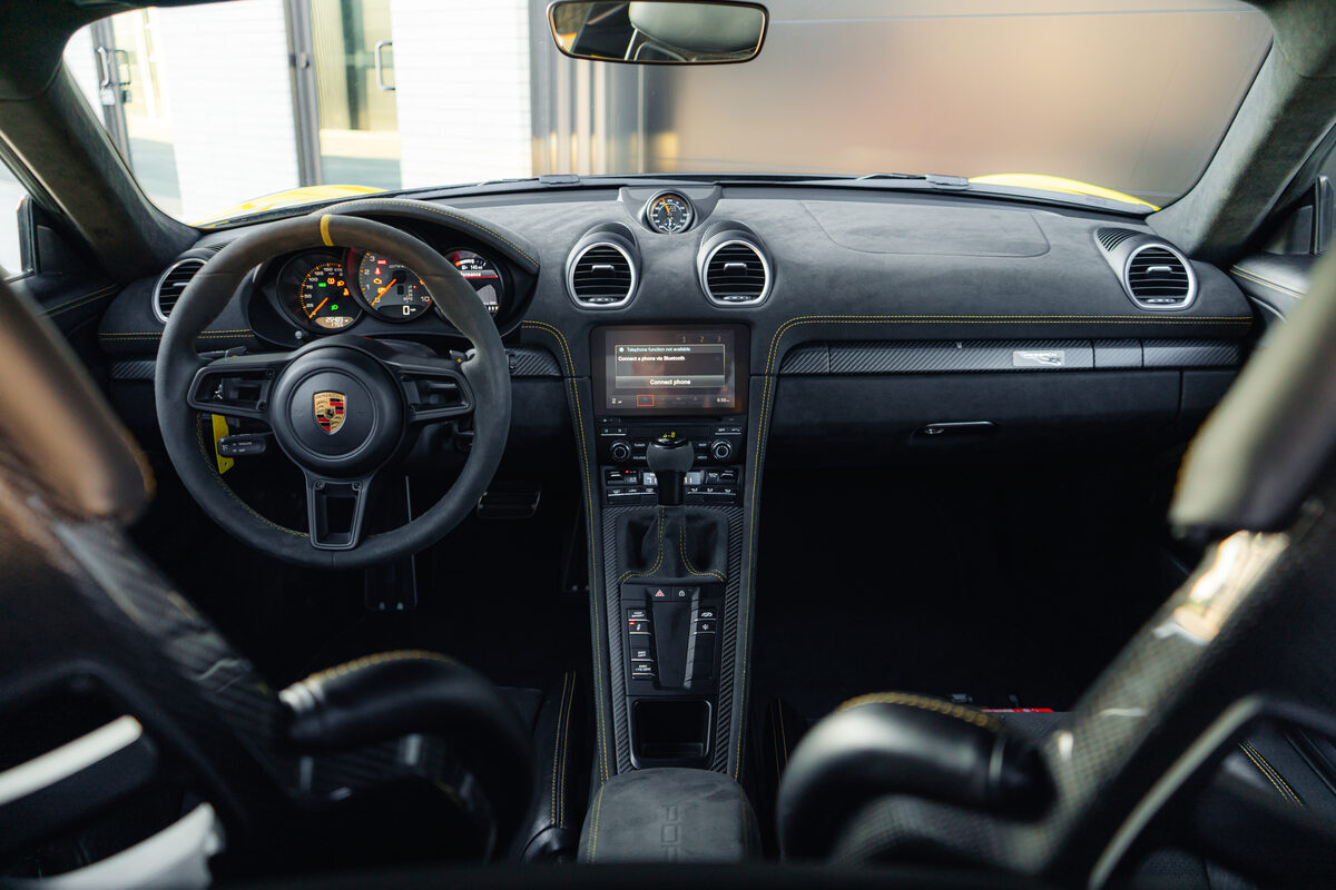 Driver-focused cockpit of the Porsche GT4 RS